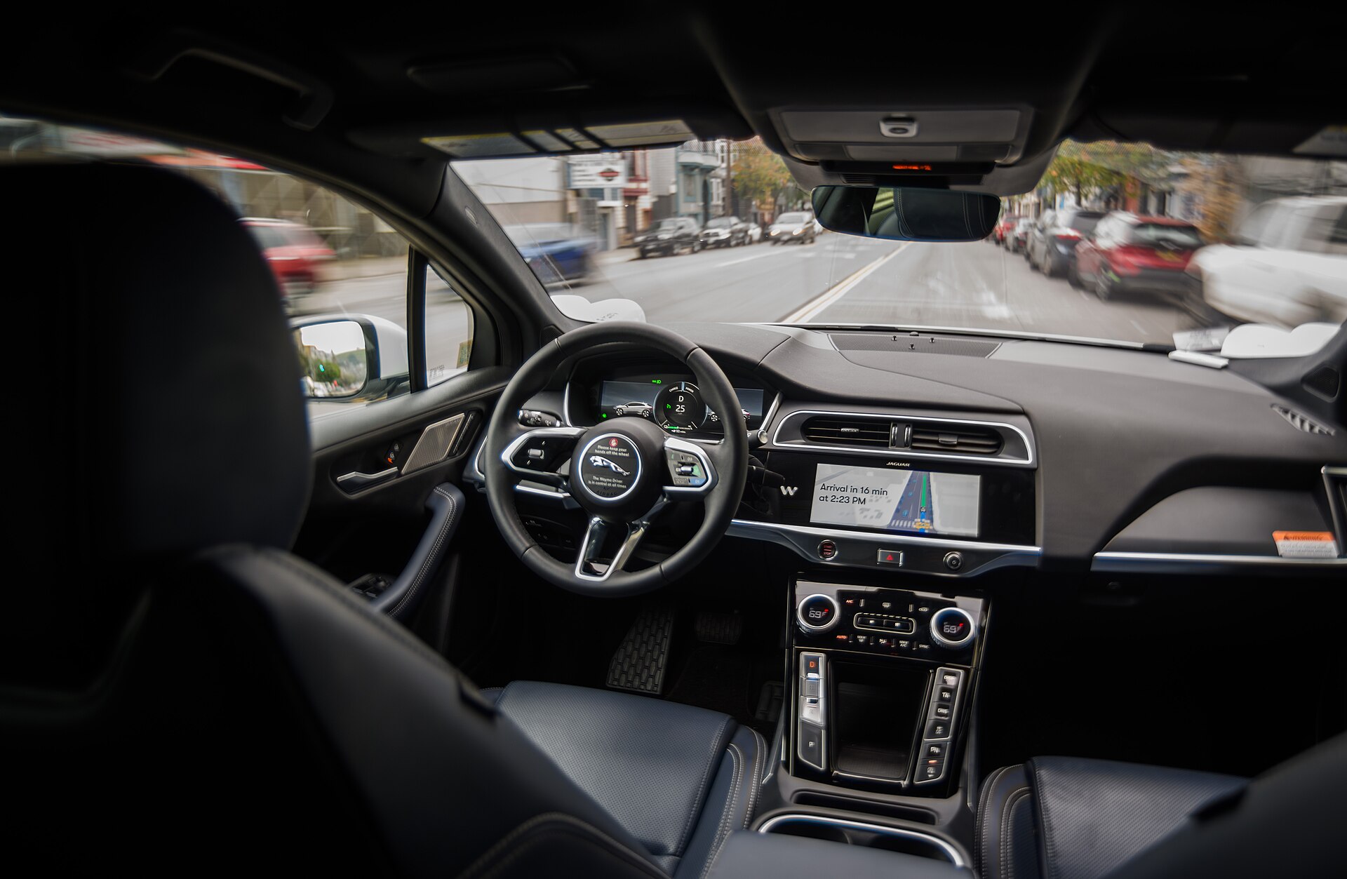 The interior of a Waymo Jaguar I-Pace robotaxi as it drives through San Francisco without a driver.
