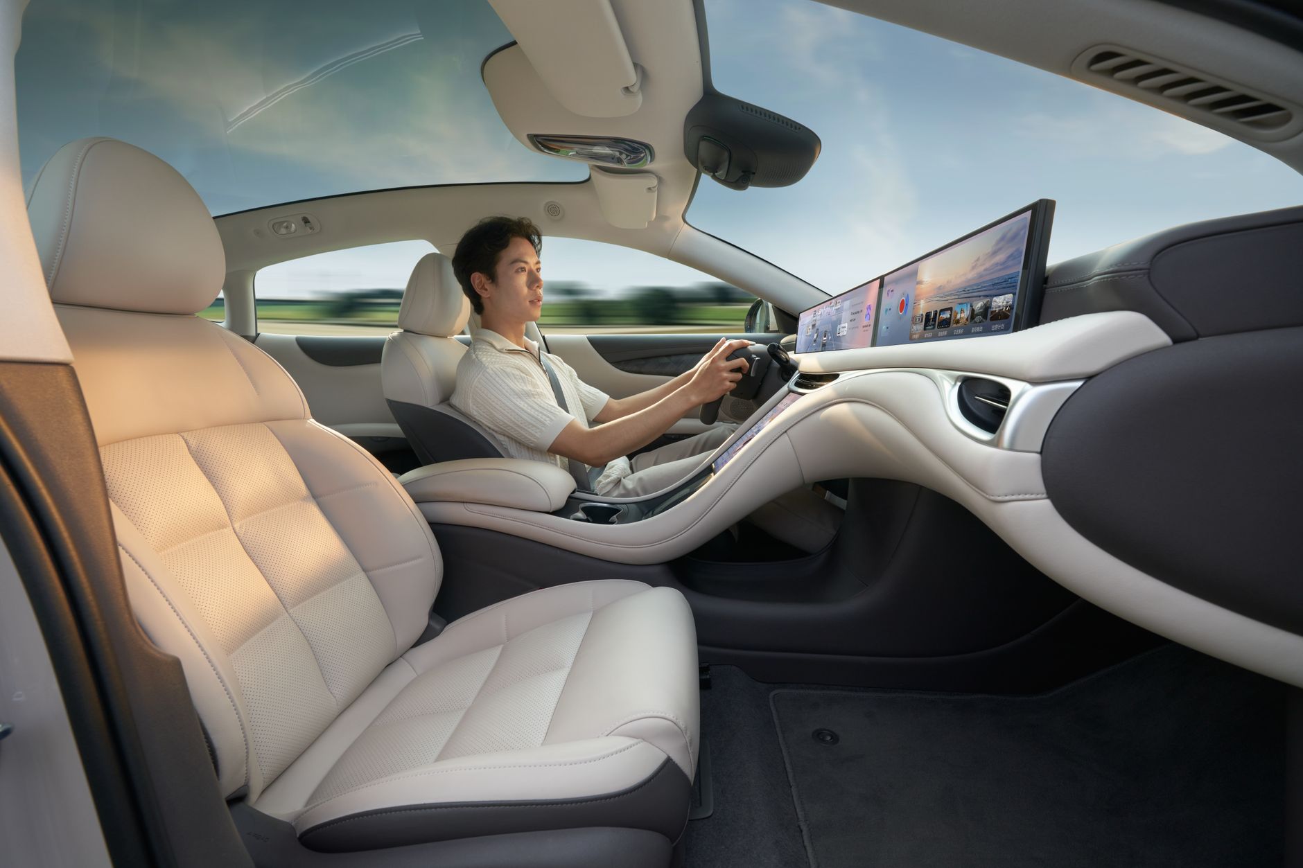 A modern electric car interior showcasing advanced technology with a driver enjoying a smooth ride.